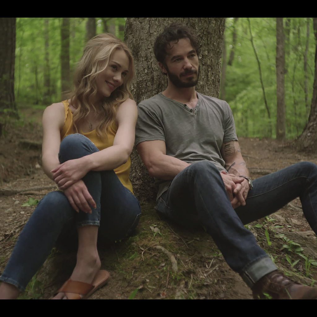 Kelcie Stranahan and Ryan Carnes in a still from the Passionflix movie The Air He Breathes.