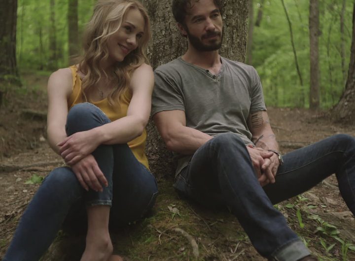 Kelcie Stranahan and Ryan Carnes in a still from the Passionflix movie The Air He Breathes.