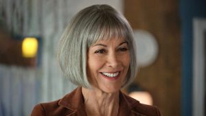 Wendie Malick smiles in The Chicken Sisters season 2. Photo: Hallmark Media/Photographer: Bettina Strauss