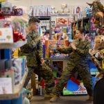 Janel Parrish and Parker Young in Christmas on Duty. Photo: Hallmark