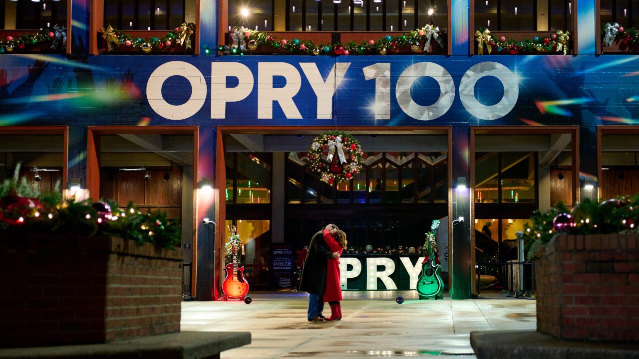 Nikki DeLoach and Kristoffer Polaha in A Grand Ole Opry Christmas. Photo: Hallmark Media.