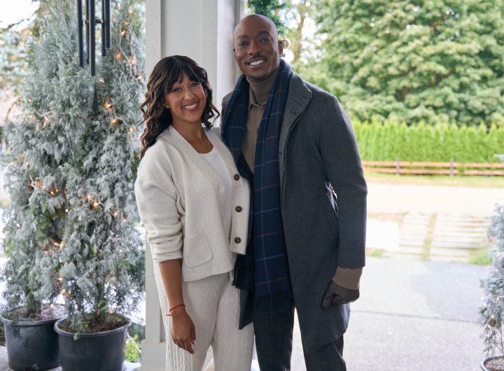 News anchor, Adam, is challenged by superfan, Robbie, to report good news at Christmas. Adam reluctantly takes him under his wing and finds a connection with Robbie’s mom. Photo: Tamera Mowry-Housley, B. J. Britt Credit: ©2025 Hallmark Media/Photographer: Syd Wong
