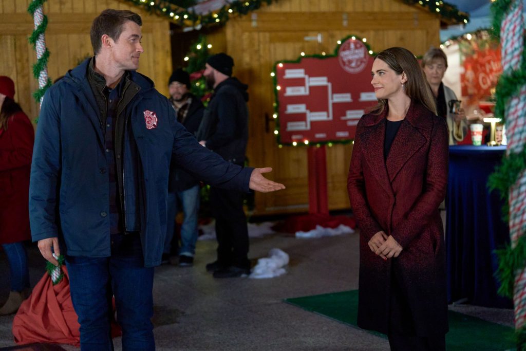 Robert Buckley and Lyndsy Fonseca in Holiday Touchdown: A Bears Love Story. Photo: Hallmark Media