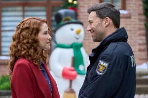 Sarah Drew and Peter Mooney in Mistletoe Murders season 3. Photo: Hallmark Media