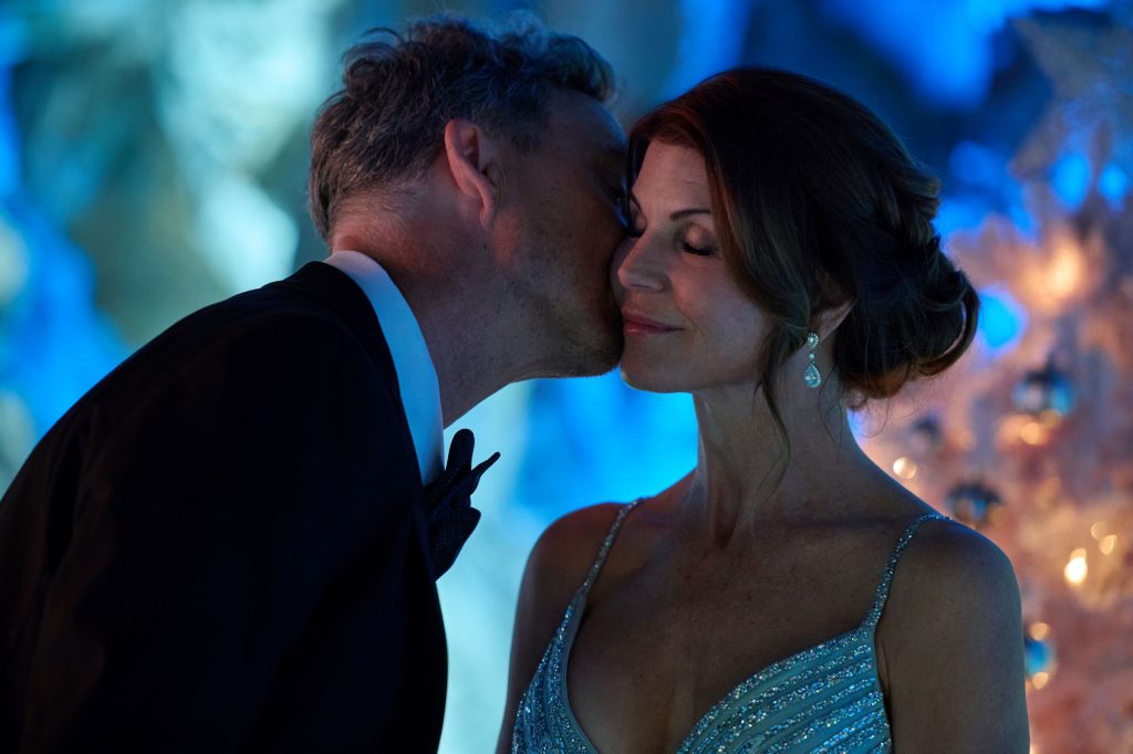 Tom Cavanagh and Lori Loughlin in What If Christmas. Credit: ©2026 Hallmark Media/Photographer: Gerry Kingsley